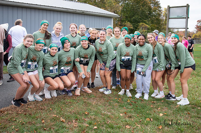 Runners pose after the Hot Chili Challenge